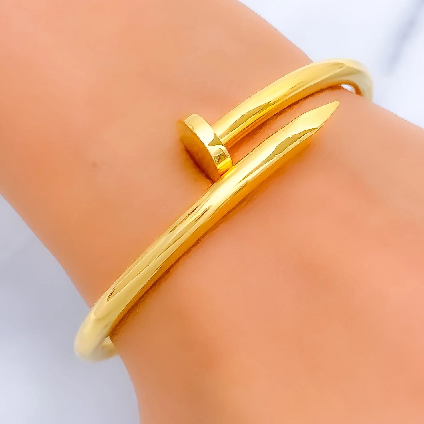 Stylish Nail Bangle for a Modern Twist on Classic Jewellery