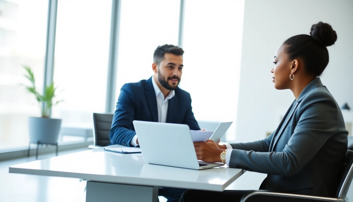 Couple reviewing Family Law Financial Agreements in a bright office environment.